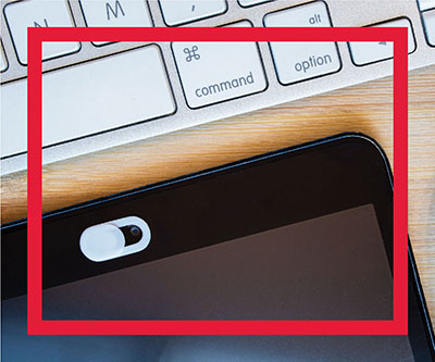 The camera of a tablet device is covered up with a privacy cover